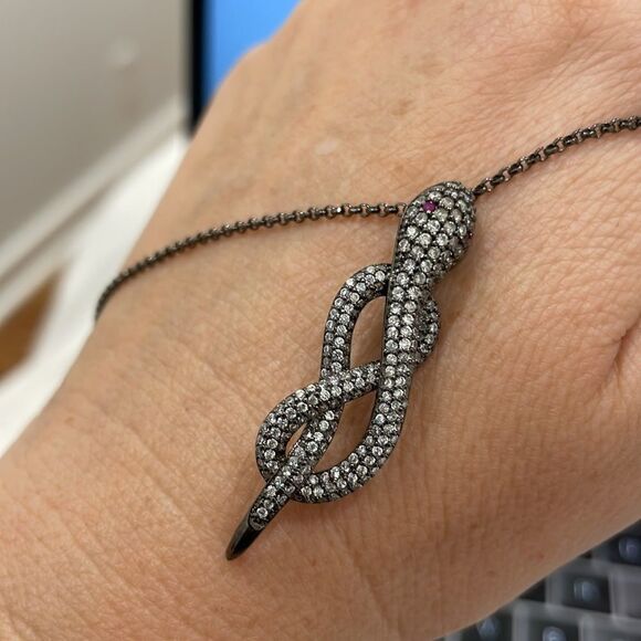 Snake necklace with faux diamonds red eyes making a figure 8 shape dark silver - Picture 2 of 7